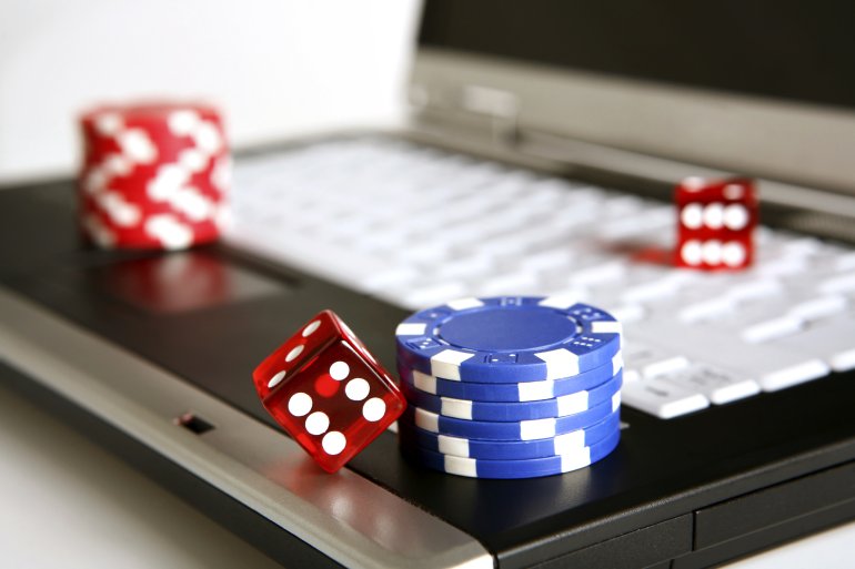 Chips and dice on a laptop